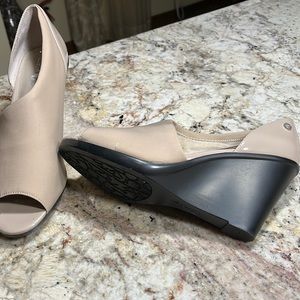 Calvin Klein tan 31/2” wedge heel with peek-a-boo toe. Size 8.